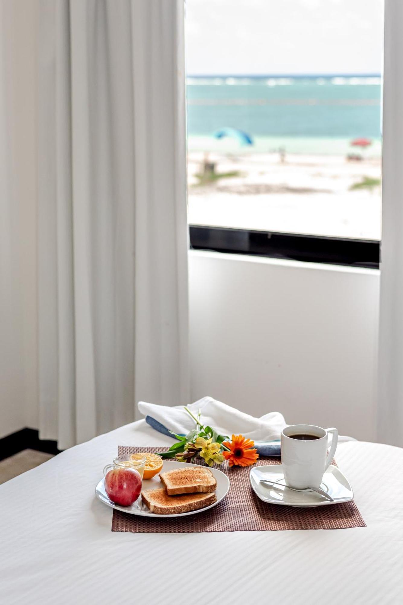 פוארטו מורלוס Vela'S Condos Ocean Front מראה חיצוני תמונה